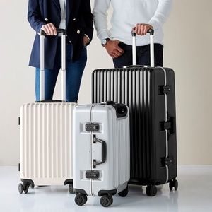 EUC 30-inch Mark and Graham Black Co-Pilot Hardshell Checked Spinner.